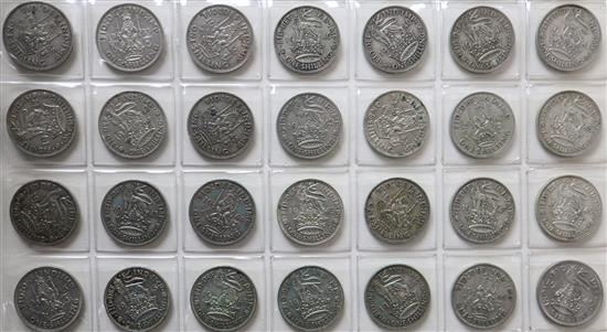 An album of assorted British coinage, including shillings, pennies, threepences etc.